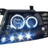  Фары передние Л+П (КОМПЛЕКТ) ТЮНИНГ линзованные со светящимся ободком(ангельские глазки), со светодиотдыми ходовыми огнями(ДХО)  EAGLE EYES внутри черные и хромированные для MITSUBISHI PAJERO III / MONTERO III (00-06)